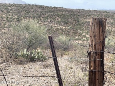 This property backs up against government land at the base of on Tubac Golf Resort and Spa in Arizona - for sale on GolfHomes.com, golf home, golf lot