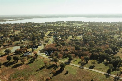 Discover the perfect balance of privacy and luxury in the on Cedar Creek Country Club in Texas - for sale on GolfHomes.com, golf home, golf lot