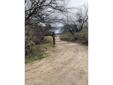 This property backs up against government land at the base of on Tubac Golf Resort and Spa in Arizona - for sale on GolfHomes.com, golf home, golf lot