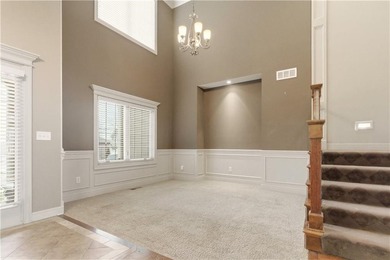 Nestled in the highly desirable Creekmoor community in Raymore on Golf Club of Creekmoor in Missouri - for sale on GolfHomes.com, golf home, golf lot