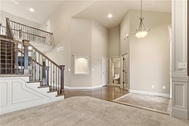 Nestled in the highly desirable Creekmoor community in Raymore on Golf Club of Creekmoor in Missouri - for sale on GolfHomes.com, golf home, golf lot