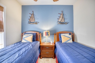 This two-bedroom, two-bath condo is located in the admired on Barefoot Resort and Golf Club  in South Carolina - for sale on GolfHomes.com, golf home, golf lot