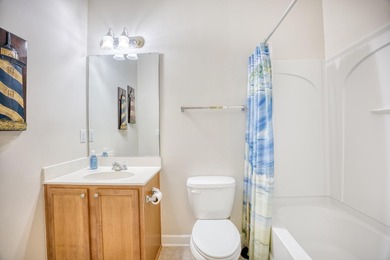 This two-bedroom, two-bath condo is located in the admired on Barefoot Resort and Golf Club  in South Carolina - for sale on GolfHomes.com, golf home, golf lot