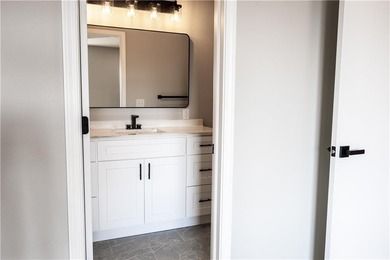 This completely remodeled 3-bedroom, 2-bath home offers modern on Bella Vista Country Club and Golf Course in Arkansas - for sale on GolfHomes.com, golf home, golf lot