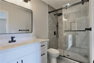 This completely remodeled 3-bedroom, 2-bath home offers modern on Bella Vista Country Club and Golf Course in Arkansas - for sale on GolfHomes.com, golf home, golf lot