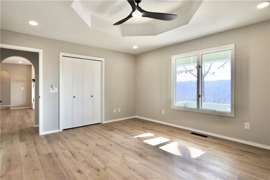 This completely remodeled 3-bedroom, 2-bath home offers modern on Bella Vista Country Club and Golf Course in Arkansas - for sale on GolfHomes.com, golf home, golf lot