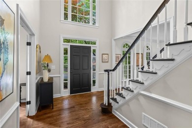 Nestled in the heart of Alpharetta this renovated home in on The Golf Club of Georgia in Georgia - for sale on GolfHomes.com, golf home, golf lot