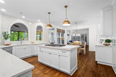 Nestled in the heart of Alpharetta this renovated home in on The Golf Club of Georgia in Georgia - for sale on GolfHomes.com, golf home, golf lot