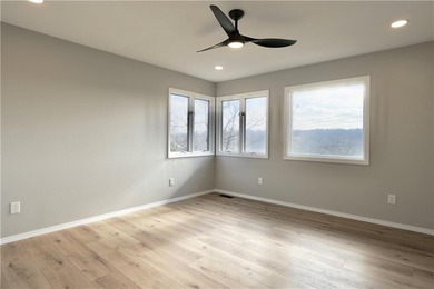 This completely remodeled 3-bedroom, 2-bath home offers modern on Bella Vista Country Club and Golf Course in Arkansas - for sale on GolfHomes.com, golf home, golf lot