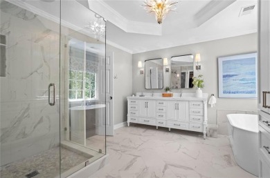 Nestled in the heart of Alpharetta this renovated home in on The Golf Club of Georgia in Georgia - for sale on GolfHomes.com, golf home, golf lot