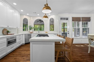 Nestled in the heart of Alpharetta this renovated home in on The Golf Club of Georgia in Georgia - for sale on GolfHomes.com, golf home, golf lot