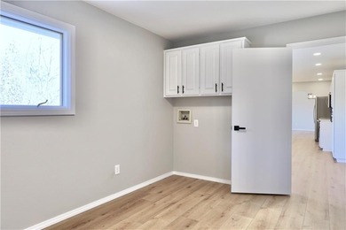 This completely remodeled 3-bedroom, 2-bath home offers modern on Bella Vista Country Club and Golf Course in Arkansas - for sale on GolfHomes.com, golf home, golf lot