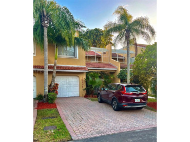 Discover this rare 3-bed, 2.5-bath townhome in a fenced, 52-home on Jim McLean Signature Course in Florida - for sale on GolfHomes.com, golf home, golf lot