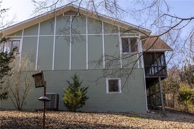 This completely remodeled 3-bedroom, 2-bath home offers modern on Bella Vista Country Club and Golf Course in Arkansas - for sale on GolfHomes.com, golf home, golf lot