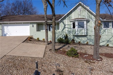 This completely remodeled 3-bedroom, 2-bath home offers modern on Bella Vista Country Club and Golf Course in Arkansas - for sale on GolfHomes.com, golf home, golf lot