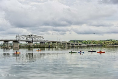 WATERFRONT POND VIEWS: Welcome to 150 Dataw Drive, a waterfront on Dataw Island Club in South Carolina - for sale on GolfHomes.com, golf home, golf lot