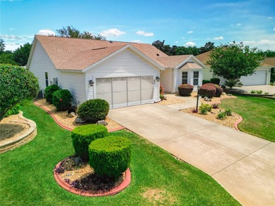 Located in the lovely Village of Briar Meadow, this GOLF COURSE on The Links of Spruce Creek in Florida - for sale on GolfHomes.com, golf home, golf lot