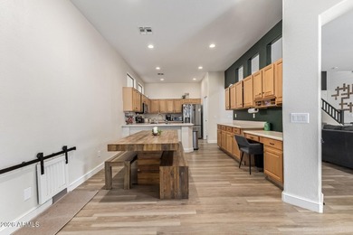 This beautifully maintained 5-bedroom, 3-bath home features a on Augusta Ranch Golf Club in Arizona - for sale on GolfHomes.com, golf home, golf lot