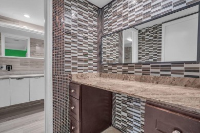 UNBELIEVABLE KING MODEL..2 MASTER SUITES..TOTALLY REMODELED WITH on Palm-Aire Country Club and Resort - Palms in Florida - for sale on GolfHomes.com, golf home, golf lot