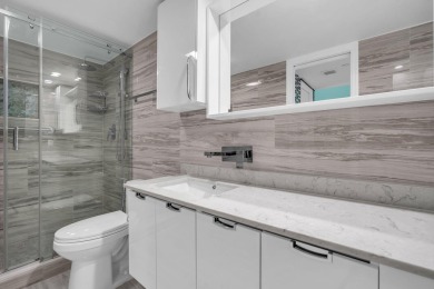 UNBELIEVABLE KING MODEL..2 MASTER SUITES..TOTALLY REMODELED WITH on Palm-Aire Country Club and Resort - Palms in Florida - for sale on GolfHomes.com, golf home, golf lot