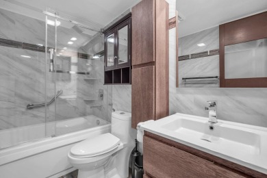 UNBELIEVABLE KING MODEL..2 MASTER SUITES..TOTALLY REMODELED WITH on Palm-Aire Country Club and Resort - Palms in Florida - for sale on GolfHomes.com, golf home, golf lot