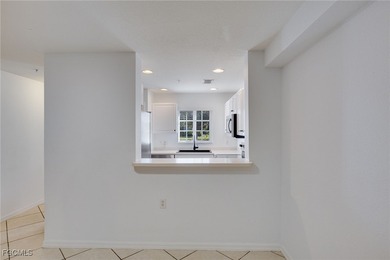 Set against a peaceful preserve backdrop, this well-maintained on Gateway Golf and Country Club in Florida - for sale on GolfHomes.com, golf home, golf lot