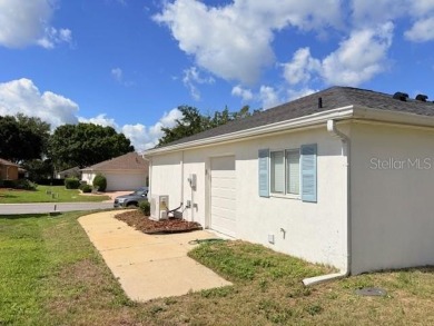 COME AND SEE THIS GORGEOUS REMODELED HOME!  THIS IS LIKE A NEW on Eagle Ridge At Spruce Creek Country Club in Florida - for sale on GolfHomes.com, golf home, golf lot