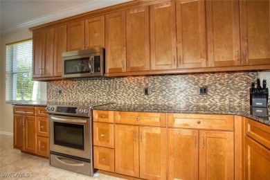 The Colonade end unit is a rare find in Heritage Palms on Heritage Palms Golf and Country Club in Florida - for sale on GolfHomes.com, golf home, golf lot