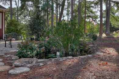 Welcome home to 306 Forest Pines Rd in THE AWARD WINNING GATED on Woodside Plantation Country Club in South Carolina - for sale on GolfHomes.com, golf home, golf lot