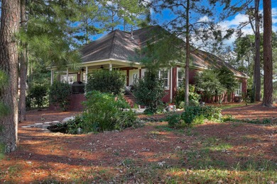 Welcome home to 306 Forest Pines Rd in THE AWARD WINNING GATED on Woodside Plantation Country Club in South Carolina - for sale on GolfHomes.com, golf home, golf lot