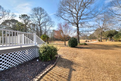 Welcome to this one owner, well cared for brick home overlooking on Players Course At Wyboo Plantation in South Carolina - for sale on GolfHomes.com, golf home, golf lot