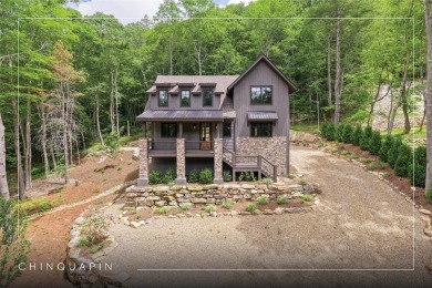 Discover the ultimate mountain living experience with this newly on Natures Walk At Chinquapin in North Carolina - for sale on GolfHomes.com, golf home, golf lot