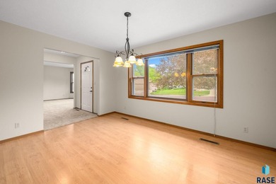 NEW ROOF, CARPET AND PAINT!! Discover the perfect blend of on Prairie Green Golf Course in South Dakota - for sale on GolfHomes.com, golf home, golf lot