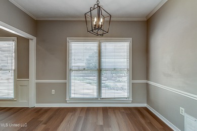 Discover this beautifully updated 3-bedroom, 2-bathroom home on Castlewoods Golf Club in Mississippi - for sale on GolfHomes.com, golf home, golf lot