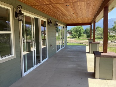 Come check out this new home located in Timberwolf subdivision on Polson Bay Golf Course - Championship Course in Montana - for sale on GolfHomes.com, golf home, golf lot