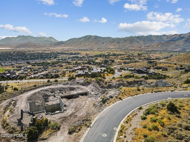 This jaw-dropping Mountain Masterpiece is ready to join the most on Red Ledges Golf Club in Utah - for sale on GolfHomes.com, golf home, golf lot