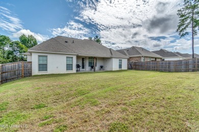 Better than new. This home has barely been lived in. Great open on Lake Caroline Golf Club in Mississippi - for sale on GolfHomes.com, golf home, golf lot