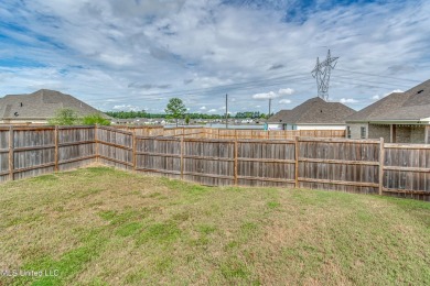 Better than new. This home has barely been lived in. Great open on Lake Caroline Golf Club in Mississippi - for sale on GolfHomes.com, golf home, golf lot