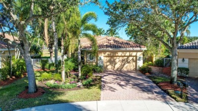 Stunning totally updated 3-bed, 3-bath home in exclusive Bay on Weston Hills Country Club in Florida - for sale on GolfHomes.com, golf home, golf lot