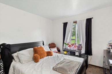Introducing this charming first floor, end unit condo with a on BlackStone Creek Golf Club in Wisconsin - for sale on GolfHomes.com, golf home, golf lot