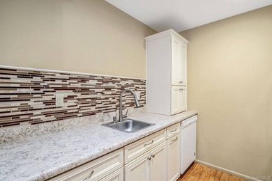 This beautifully maintained Greenbriar model is located in a on Leisure Village Golf Course in New York - for sale on GolfHomes.com, golf home, golf lot