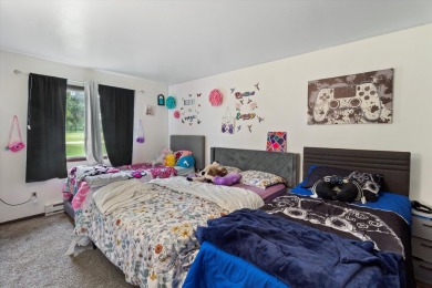 Introducing this charming first floor, end unit condo with a on BlackStone Creek Golf Club in Wisconsin - for sale on GolfHomes.com, golf home, golf lot