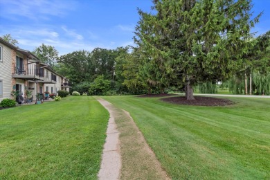 Introducing this charming first floor, end unit condo with a on BlackStone Creek Golf Club in Wisconsin - for sale on GolfHomes.com, golf home, golf lot