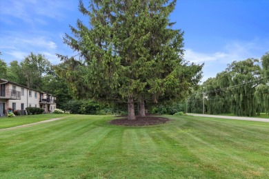Introducing this charming first floor, end unit condo with a on BlackStone Creek Golf Club in Wisconsin - for sale on GolfHomes.com, golf home, golf lot
