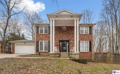 Nestled in the highly sought-after gated community of Doe Valley on Doe Valley Country Club in Kentucky - for sale on GolfHomes.com, golf home, golf lot