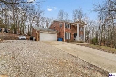 Nestled in the highly sought-after gated community of Doe Valley on Doe Valley Country Club in Kentucky - for sale on GolfHomes.com, golf home, golf lot