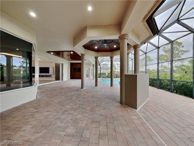 Experience modern luxury in this fully updated 2024 smart home on Shadow Wood Preserve in Florida - for sale on GolfHomes.com, golf home, golf lot