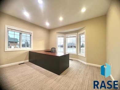 Prime executive office opportunity overlooking the 18th green in on Prairie Green Golf Course in South Dakota - for sale on GolfHomes.com, golf home, golf lot