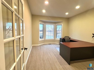 Prime executive office opportunity overlooking the 18th green in on Prairie Green Golf Course in South Dakota - for sale on GolfHomes.com, golf home, golf lot