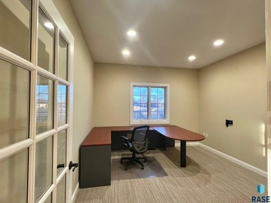 Prime executive office opportunity overlooking the 18th green in on Prairie Green Golf Course in South Dakota - for sale on GolfHomes.com, golf home, golf lot